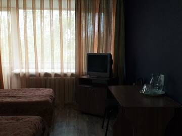 Фото номера Двухместный номер с 2 отдельными кроватями и душем Отель Tourist Hotel г. Усть-Каменогорск 3