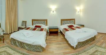 Фото номера Стандартный двухместный номер с 2 отдельными кроватями Отель Ainaline Hotel г. Усть-Каменогорск 6