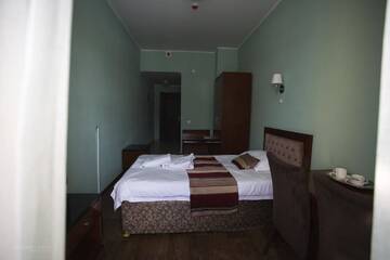 Фото номера Стандартный одноместный номер Отель Ainaline Hotel г. Усть-Каменогорск 3