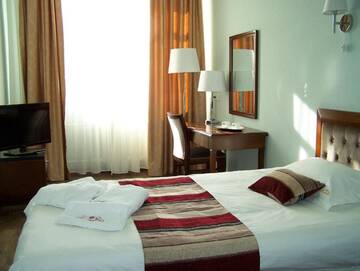 Фото номера Стандартный одноместный номер Отель Ainaline Hotel г. Усть-Каменогорск 4