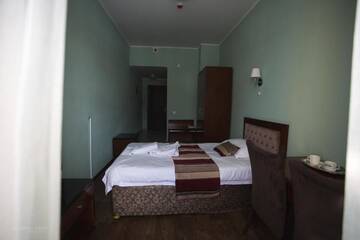 Фото номера Стандартный одноместный номер Отель Ainaline Hotel г. Усть-Каменогорск 9